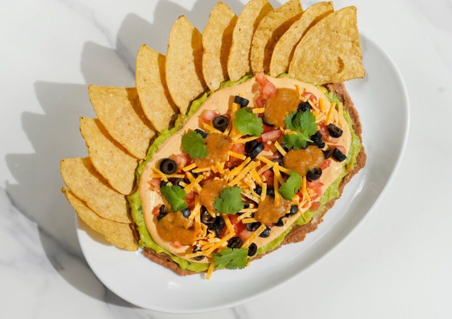 7 layer dip catering menu with tortilla chips for march madness from paramount events in chicago