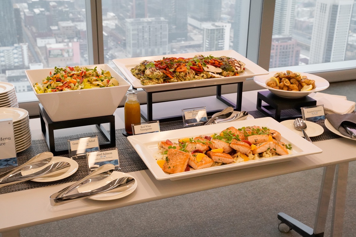 admin professional day catering in chicago high-end office corporate event lunch with baked salmon, lettuce salad, chicken reast, and roasted potatoes